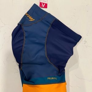 NWT Primal bike shorts. Blue, green and orange